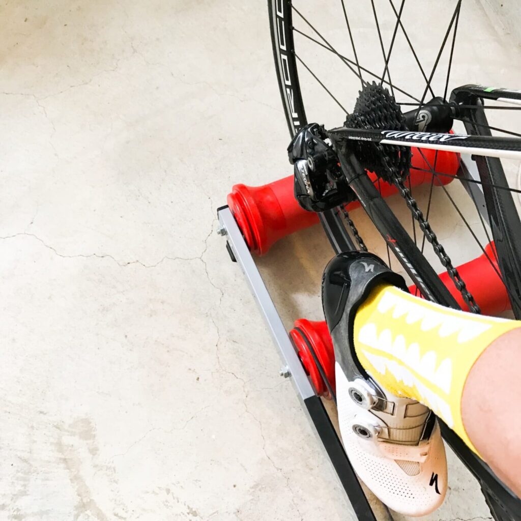 A bicycle on a trainer.